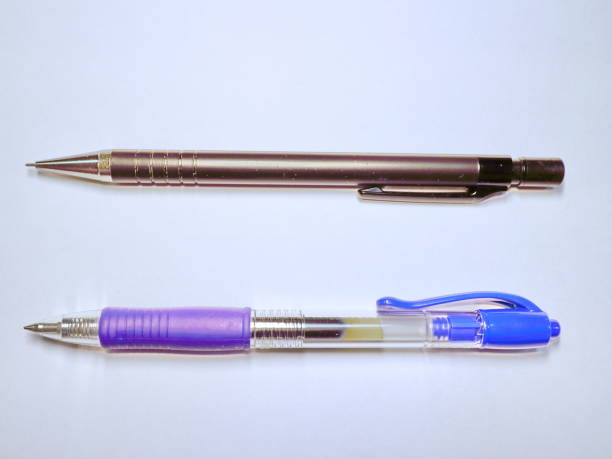 istock stationery pen and pencil on white background 899296182