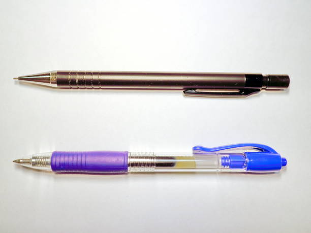 istock stationery pen and pencil on white background 899296194