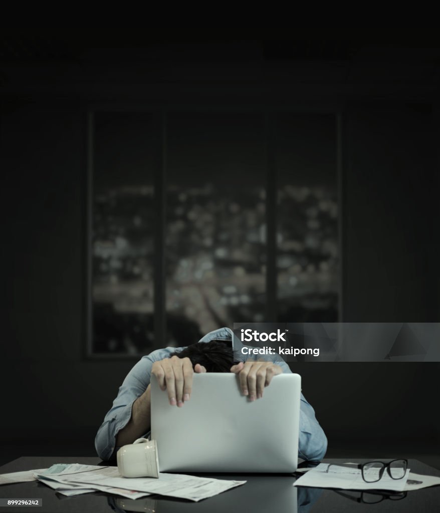 an crawling on computer laptop, with building window Emotional Stress Stock Photo