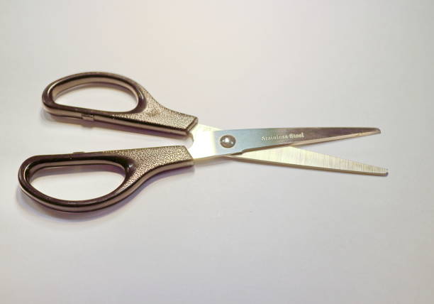 istock stationery scissors on a white background 899296368