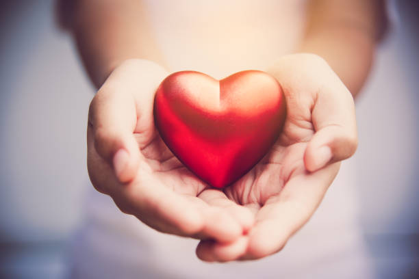 istock Hand give red heart for love 899296886