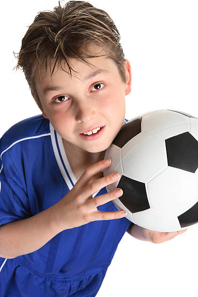 istock Boy holding a soccer ball 89930047
