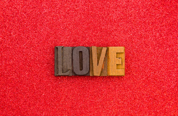 istock Valentines Themed Background on a Red Glitter 899303722