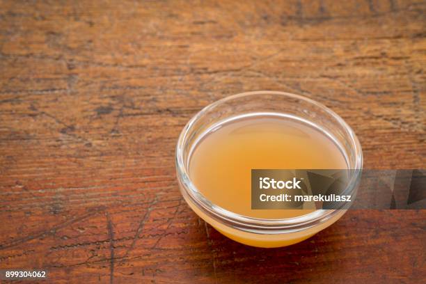 Unfiltered Raw Apple Cider Vinegar Stock Photo - Download Image Now - Apple Cider Vinegar, Bowl, Hot Apple Cider