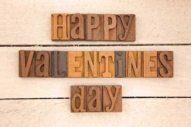 istock Valentines Themed Background on a Wooden Table 899305320
