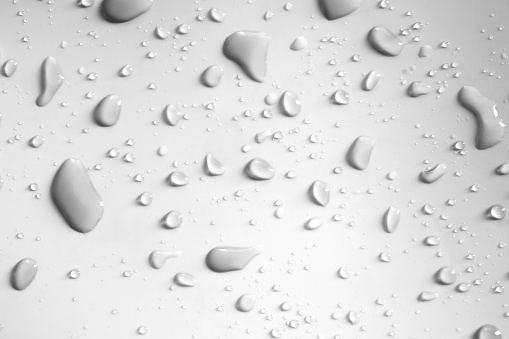 The texture of a cosmetic serum with bubbles in closeup. Copy space.