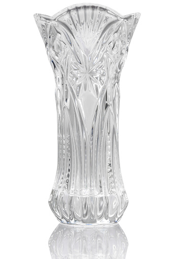 Empty crystal vase isolated on white background