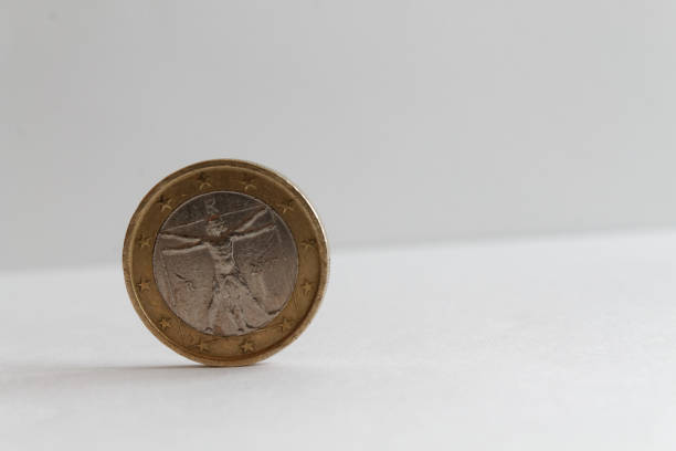 istock Euro coin on isolated white background Denomination is one euro - back side 899314076