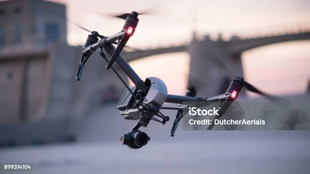 Drone In Flight Stock Photo - Download Image Now - Drone, DJI - Technology Company, Flying