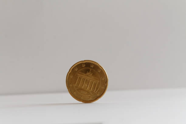 istock Euro coin on isolated white background Denomination is twenty euro cents - back side 899316664