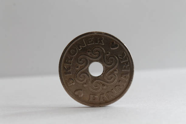 istock Denmark coin denomination is 5 krone (crown) lie on isolated white background - back side 899316994