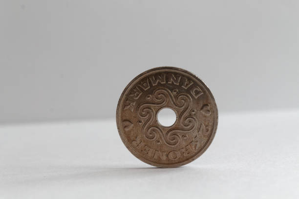 istock Denmark coin denomination is 2 krone (crown) lie on isolated white background - back side 899317530