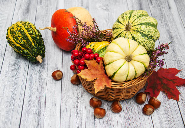 istock Pumpkins with autumn leaves 899321768