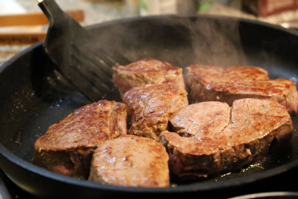istock Beef fillet (beef tenderloin) grilling in the frying pan 899325768