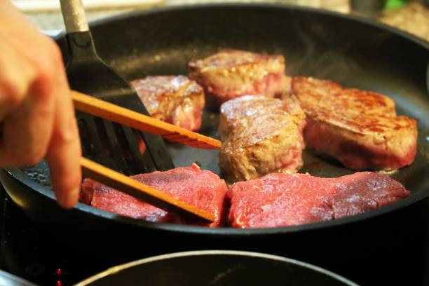 istock Beef fillet (beef tenderloin) grilling in the frying pan 899325782