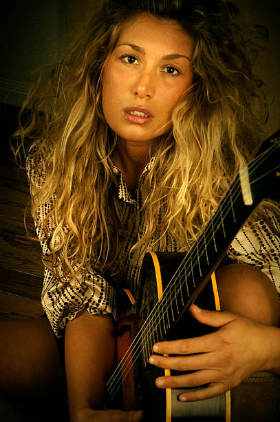 istock Woman with Guitar 89932656