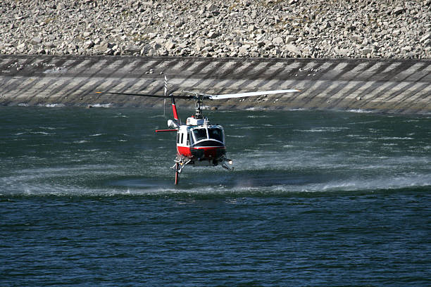 istock Fire Fighting Helicopter Filling Water tank 89932755