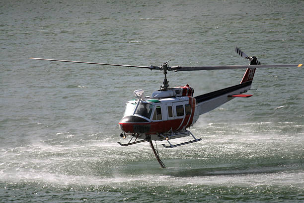istock Fire Fighting Helicopter Refilling Water Tank 89932882