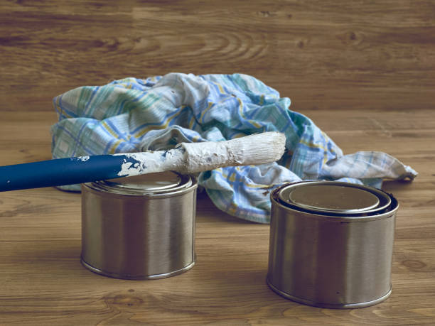 istock Paint buckets, brush, rag, set of painter tools 899329234