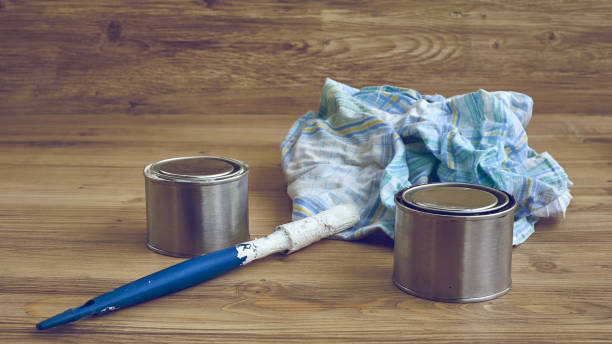 istock Paint buckets, brush, rag, set of painter tools 899329264