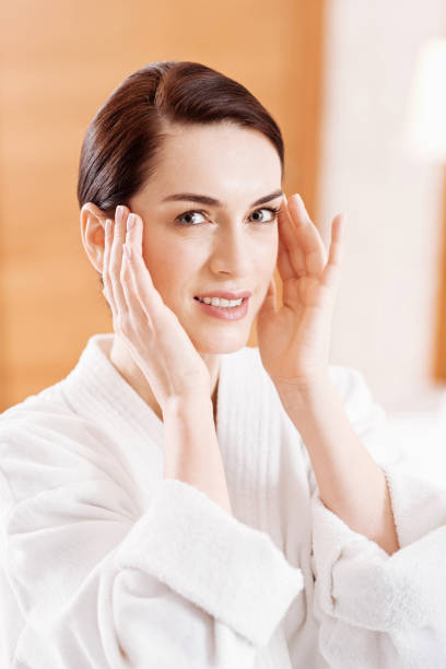 istock Gay good looking woman touching her temples 899330660