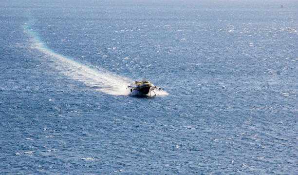 istock Ferry Boat super speed on the sea 899331384
