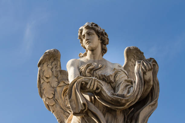 istock Angel with the Garment and Dice (Rome, Italy) 899335118