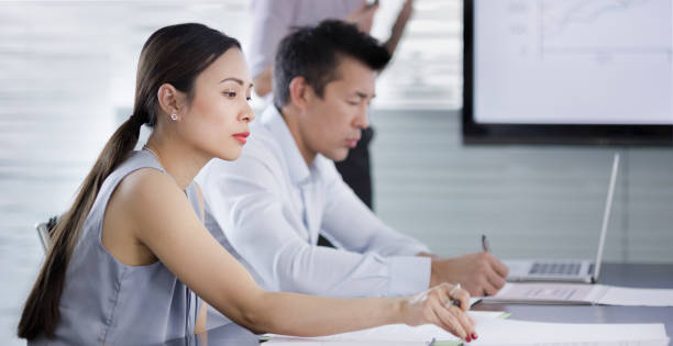 istock Business people working in conference room 899339140