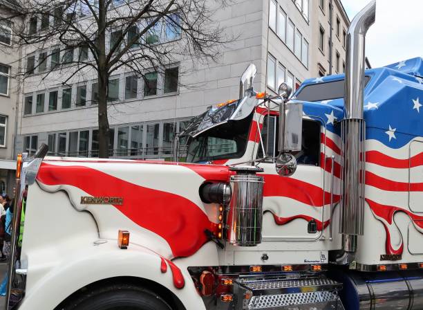 American truck Aachen, Germany – February 27, 2017: photography showing a big truck with an american flag paint. This truck is a part of a float in the parade of the famous carnival of the city of Aachen, Germany. aachen photos stock pictures, royalty-free photos & images