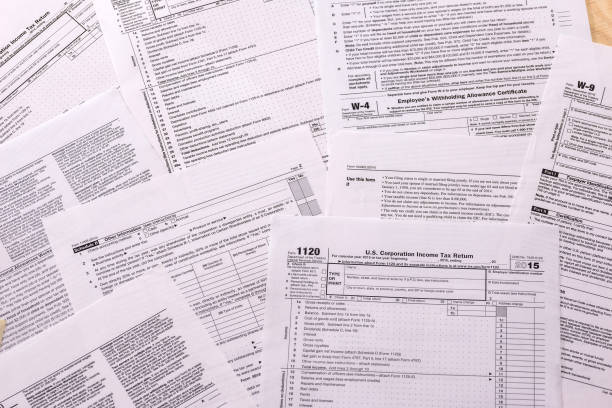 istock printed form 1120 w 4 on paper - close up 899346816