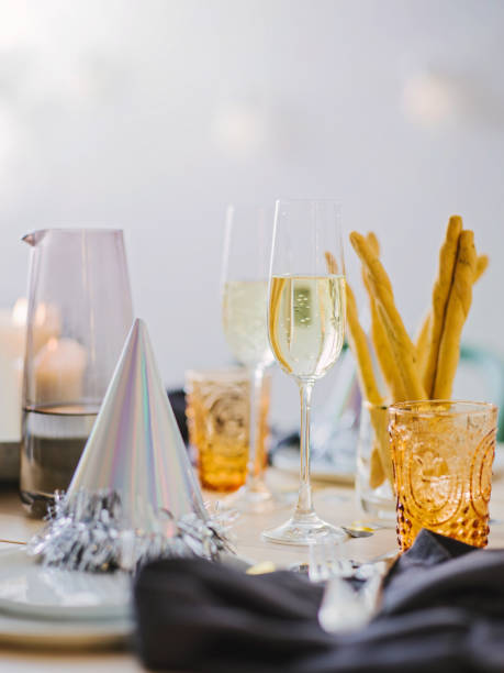 istock New years still life dinner place setting with champagne 899347230