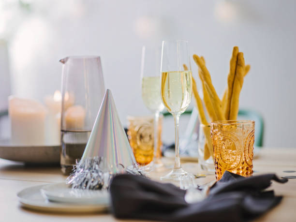 istock New years still life dinner place setting with champagne 899347250