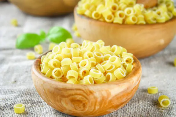 Ditalini macaroni. Pasta rings. Tubettini and thimbles Anellini