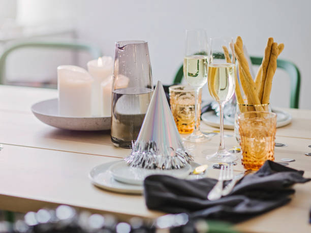 istock New years still life dinner place setting with champagne 899350368