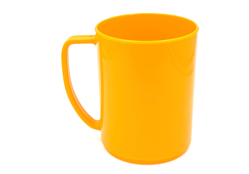 empty Orange plastic cup isolated on white background of file with Clipping Path .
