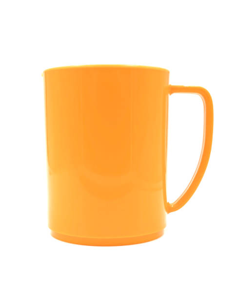 istock empty Orange plastic cup isolated on white background of file with Clipping Path 899350880