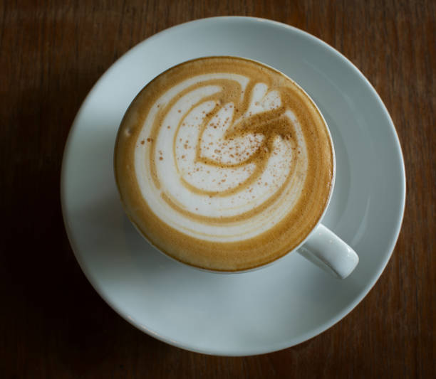 istock cups of coffee on a wooden table 899351958