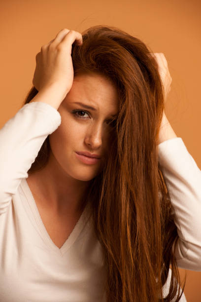 istock illness woman having headache and feeling unweal 899352072