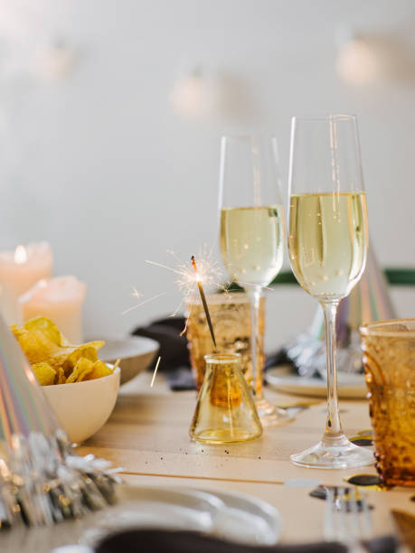 istock New years still life dinner place setting with champagne 899352350