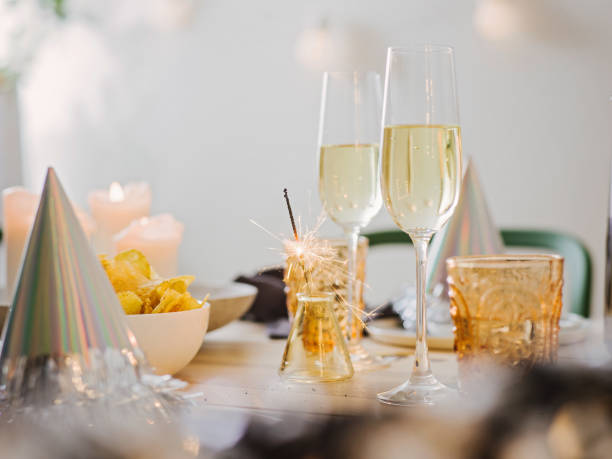 istock New years still life dinner place setting with champagne 899352394