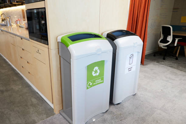 istock Recycling bins in a modern office kitchen 899352538