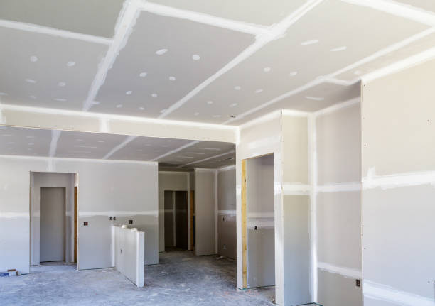 Finished Sheetrock in New Home Finished Sheetrock in New Home Construction dry stock pictures, royalty-free photos & images
