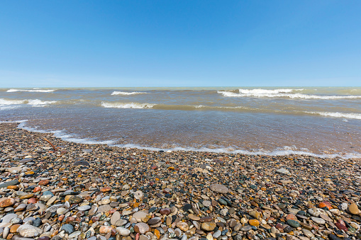 Lake Huron beach covered in pebbles - Pinery Provincial Park, Ontario, Canada