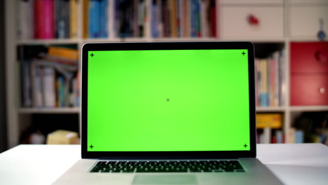Green screen on approaching laptop