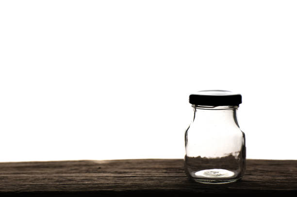 istock Small glass for herbal spoon,On wood 899374004