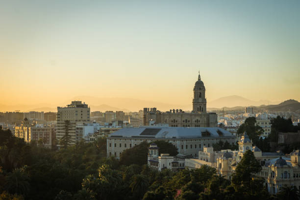 Malaga city view at sunset stock photo