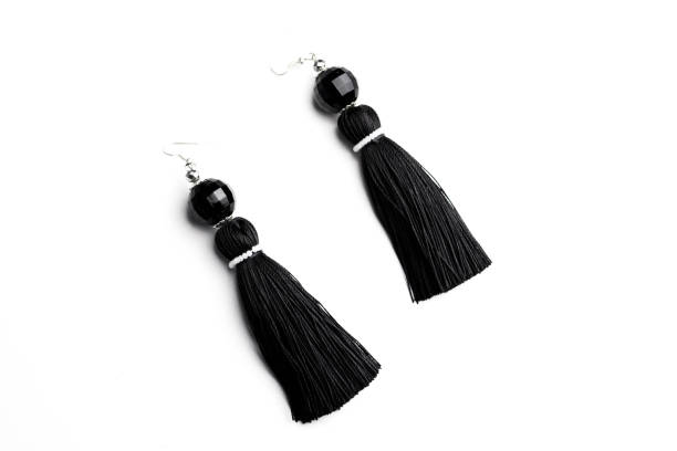 istock Luxury earrings in black on white 899384186