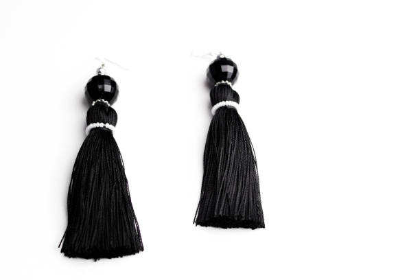 istock Luxury earrings in black on white 899384224