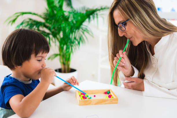 istock Child psychology, preschooler doing tests 899385384