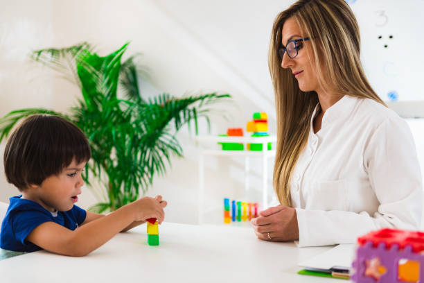istock Child psychology, preschooler doing tests 899385498
